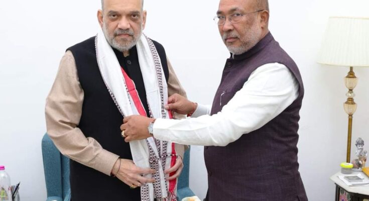 Amit Shah talks with the chief minister of Manipur during recent unrest in the state.
